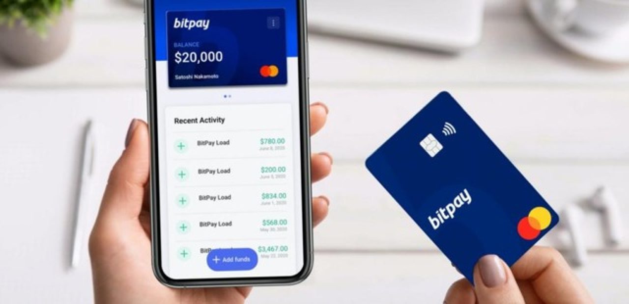 BitPay adds Apple Pay support for its prepaid Mastercard which allows users to instantly convert their cryptocurrencies into fiat to pay for goods and services (Corinne Reichert/CNET)